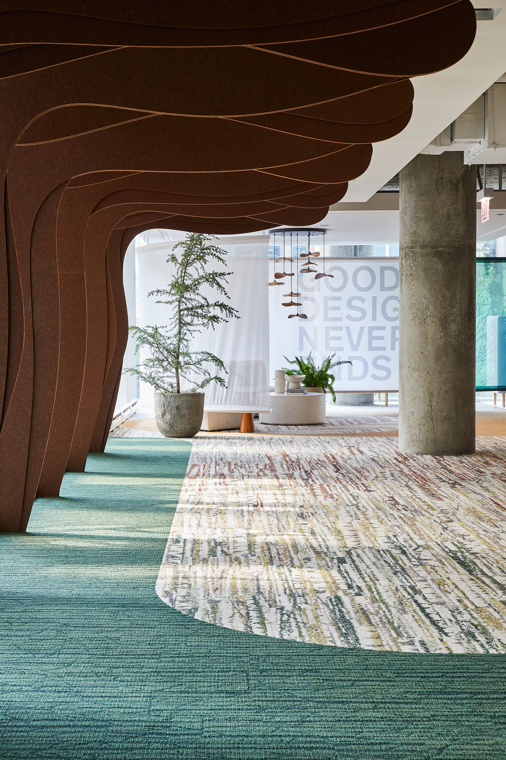 Interface Spruce it Up and Shifting Seasons plank carpet tile in corporate showroom corridor