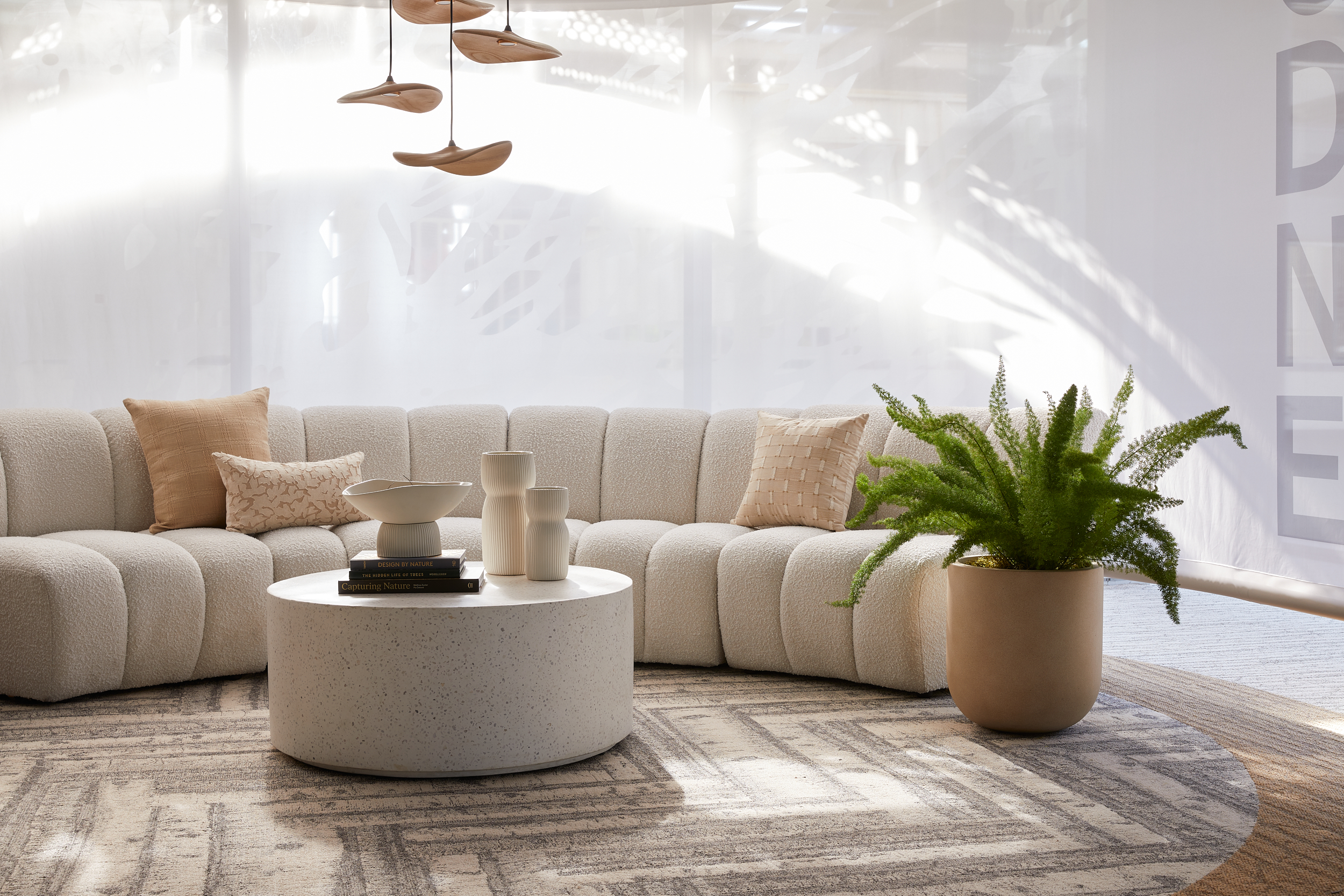 Interface First Light, Spruce it Up and Quiet Grove plank carpet tile in showroom collaborative space