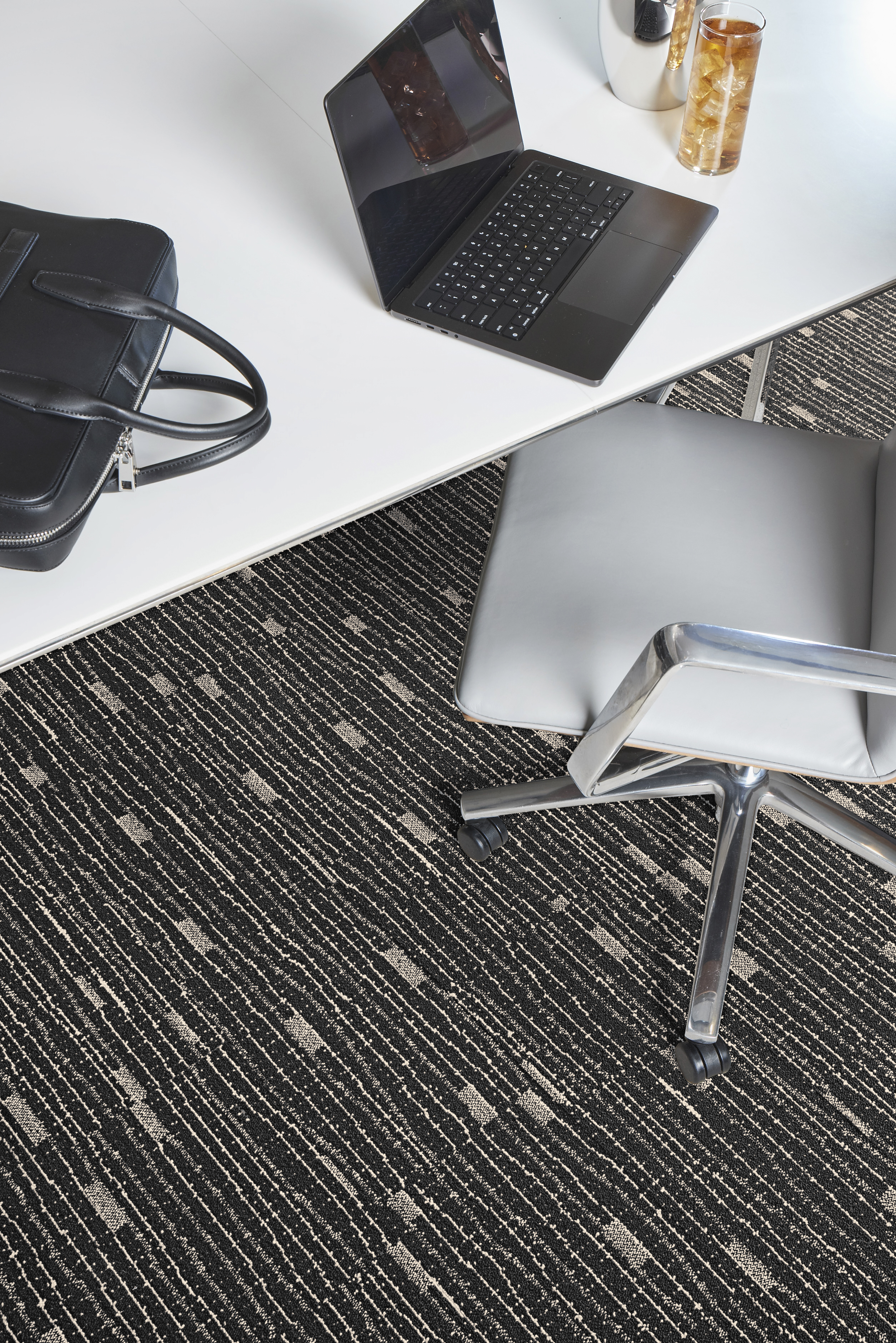 Interface Tied Together II plank carpet tile in office