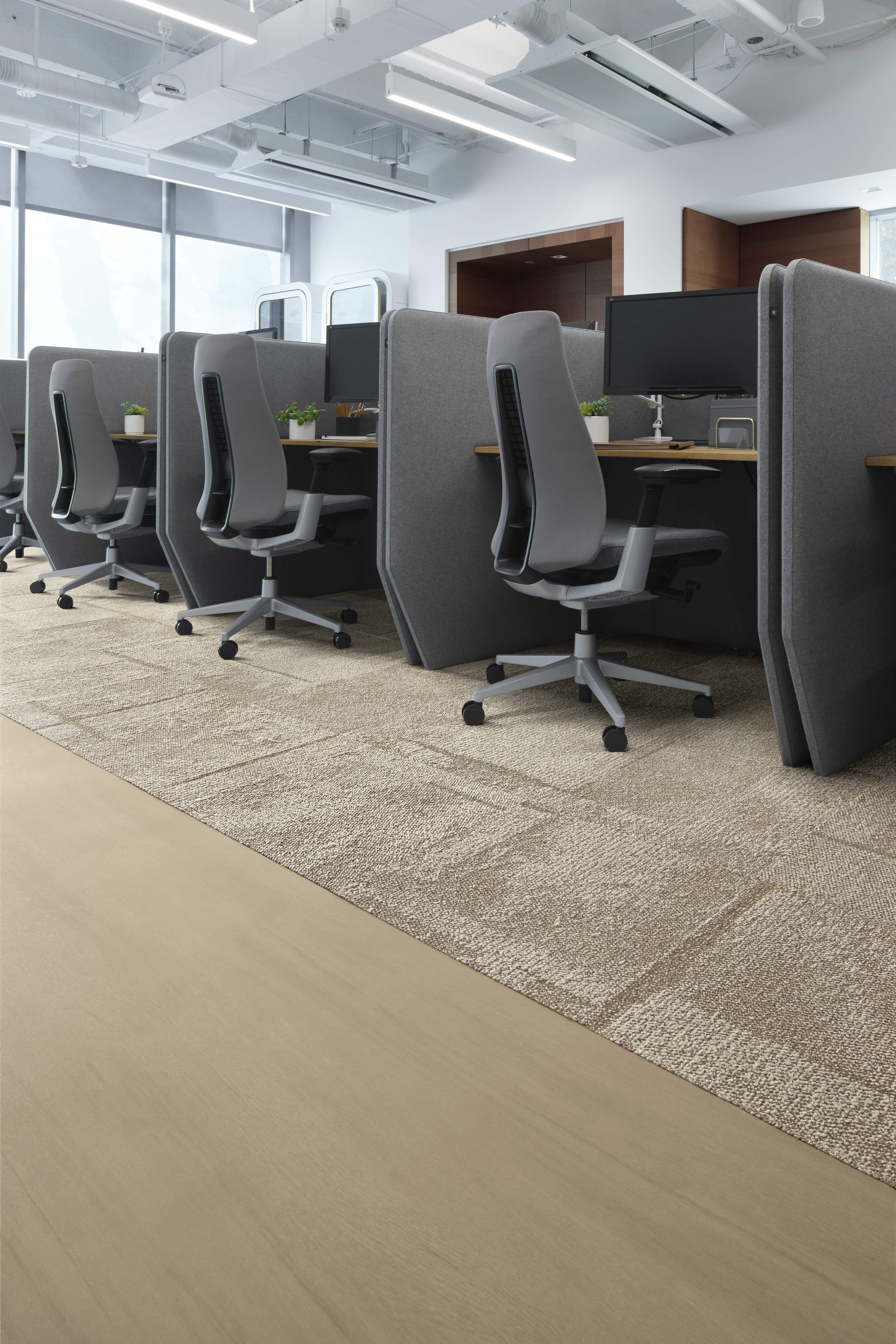 Interface Pillars carpet tile with On Grain plank LVT in open office