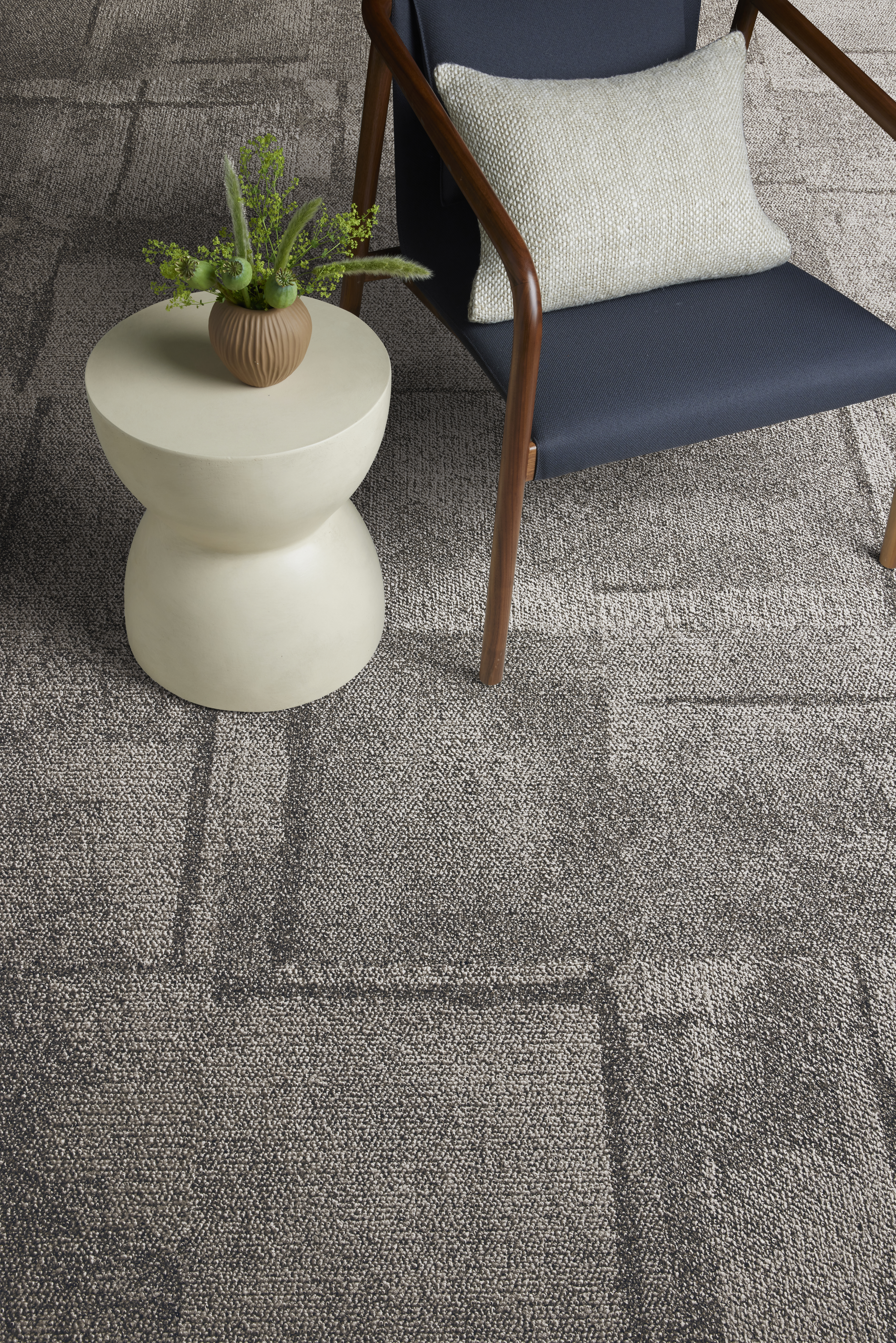 Close-up of Interface Pillars carpet tile in waiting area