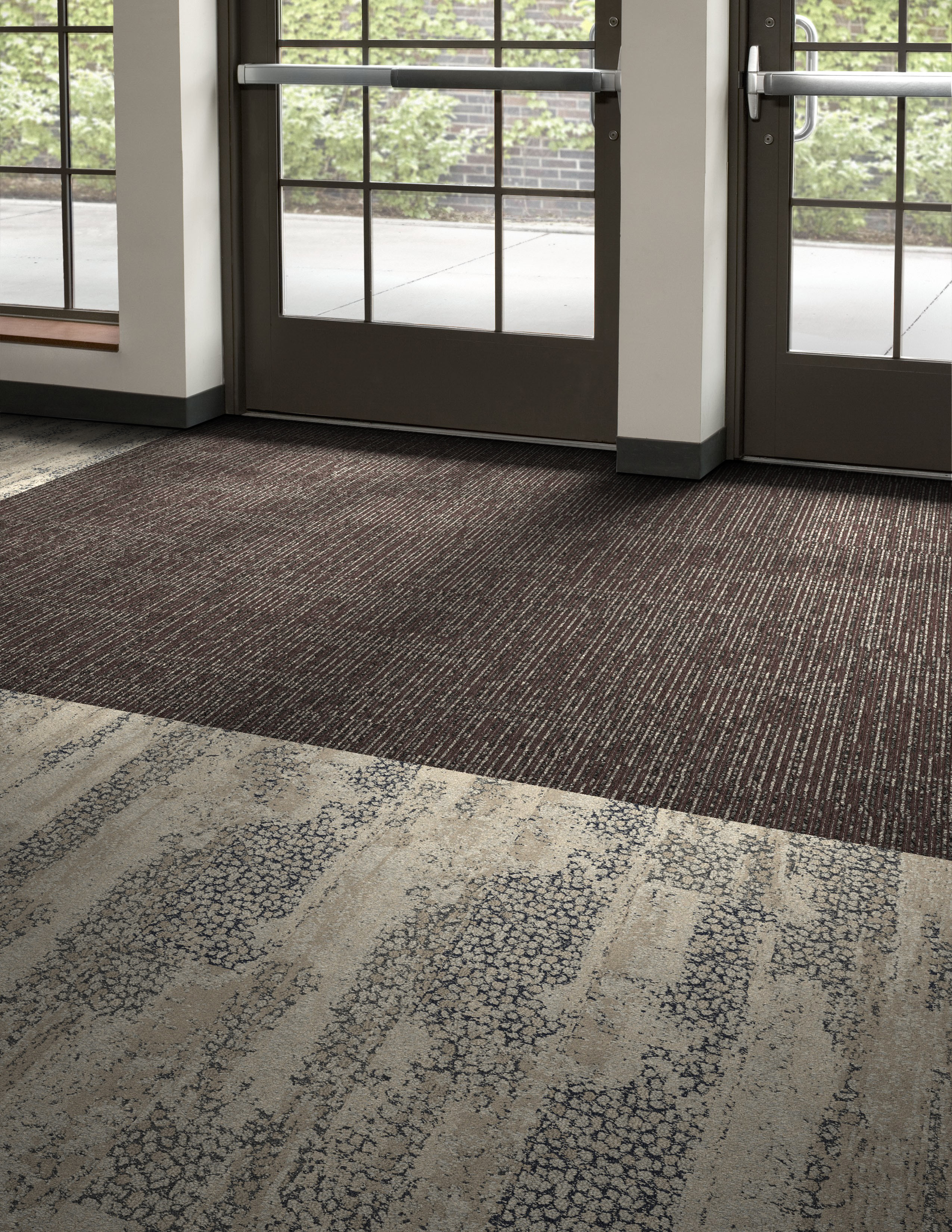 Interface SR899 carpet tile with HN850 plank carpet tile in entryway