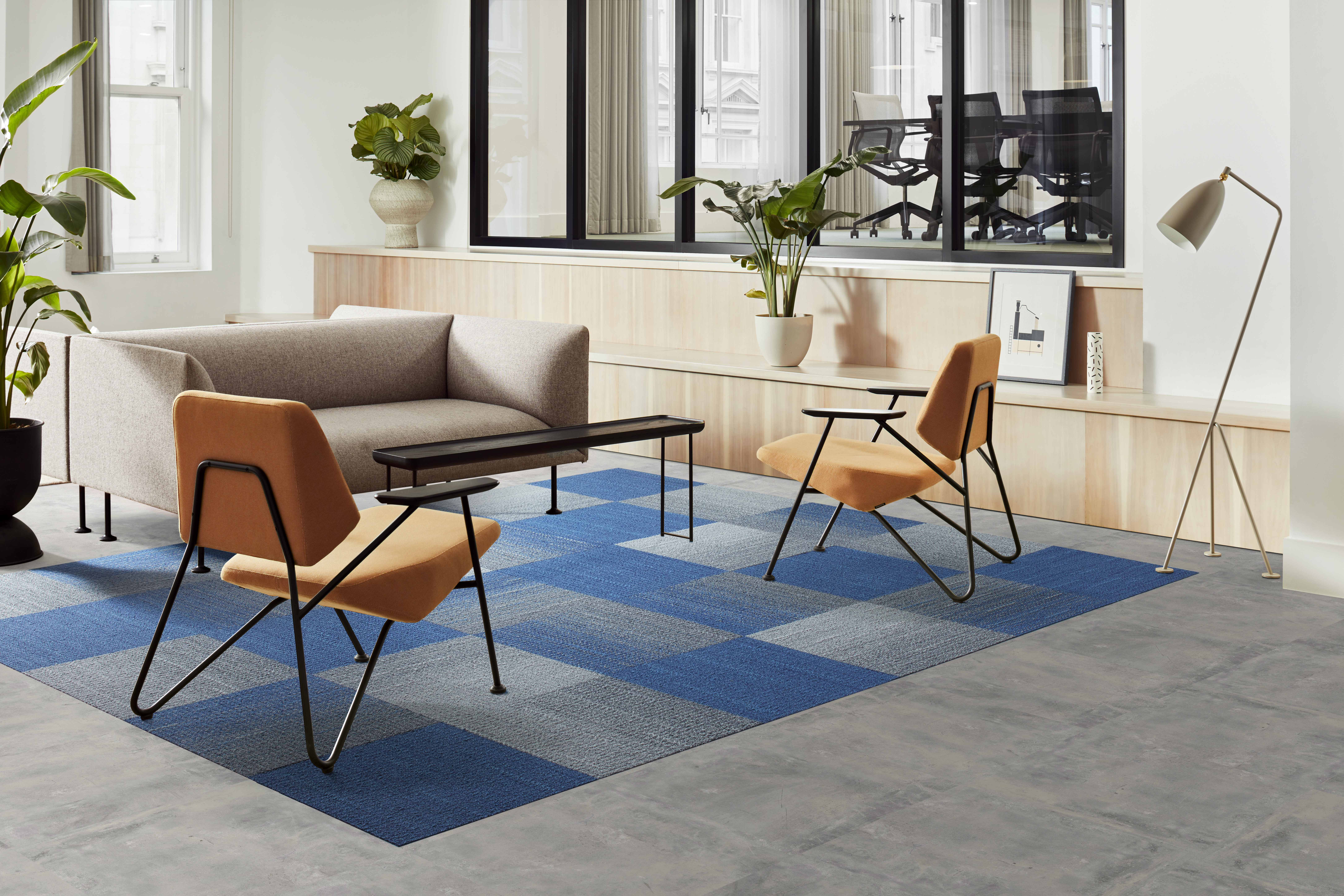 Interface WG100 and WG200 carpet tile with Level Set Stones LVT in workplace lobby